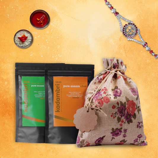 Rakhi Hamper for Brother with rakhi, green tea, Assam chai and roli chawal in a jute potli bag