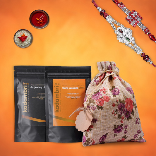 Rakhi Hamper for Brother and Bhabhi with two rakhis, Darjeeling tea, Assam chai and roli chawal in a jute potli bag